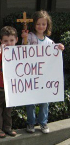 CatholicsComeHome.org sign holding