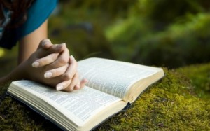 woman-praying-with-bible-featured-w480x300-300x187