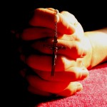 rosary in hand_red